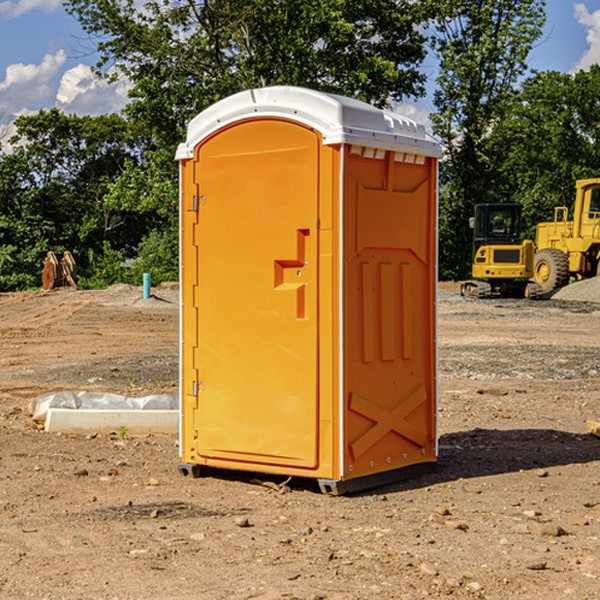 how often are the porta potties cleaned and serviced during a rental period in Long Island KS